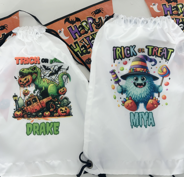 Add a personalised touch to your Halloween celebrations with our customisable Trick or Treat Drawstring Bags! Each bag is adorned with spooky Halloween designs—think pumpkins, bats, and ghosts—making it the perfect accessory for kids and adults alike to carry their treats in style. The best part? You can personalise each bag with a name, making it a unique and thoughtful addition to any trick-or-treating adventure or Halloween party. These durable and fun drawstring bags are not only practical for carrying sweets but also serve as a cute keepsake that can be reused year after year. Perfect for spooky Halloween events and trick-or-treating!