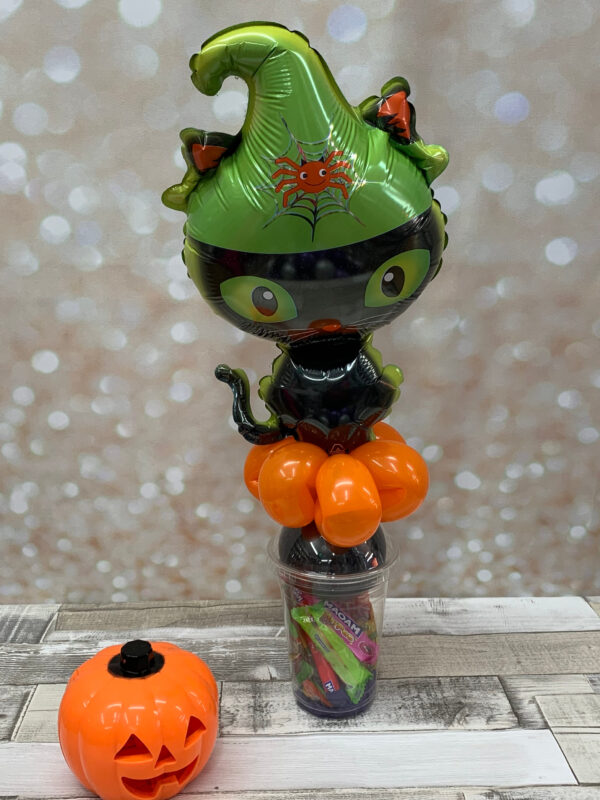 Spook up your celebrations with our Halloween Candy Cup! Filled with sweet treats and topped with a fun air-filled Halloween-themed microfoil mini balloon, this is the perfect party favour or spooky gift. A must-have for any Halloween event. Please inform us of any food allergies.